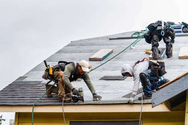 Professional Gutter Installation technician working in Burbank, SD
